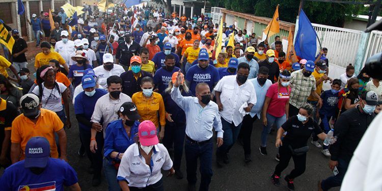 Manuel Rosales y Rafael Ramírez caminaron 9 parroquias en un día
